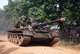 Sri Lanka: LTTE fighters riding on a captured Sri Lankan Army T55 tank, c. 1994